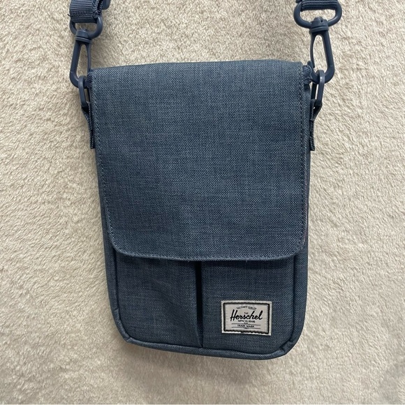 Herschel Supply Company Handbags - Herschel Pender sleeve crossbody bag blue fleece lined
